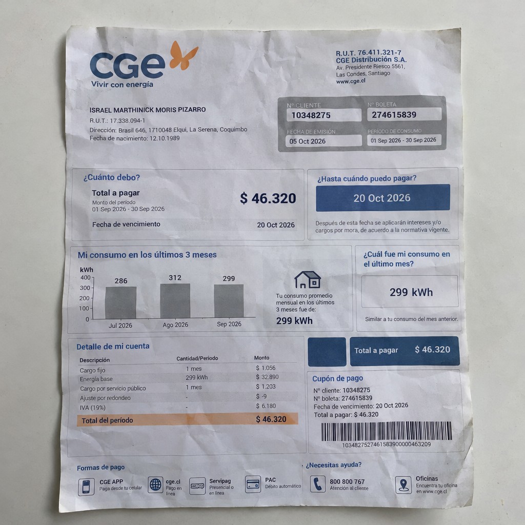 Create a statement, an electricity bill in CHILE. The A4 statement should be realistic, as if it were photographed on a phone. The document should be on a white background. The document must be for the last 3 months of October 2026. The document should contain several transactions and be wrinkled at the edges.
Name ISRAEL MARTHINICK MORIS PIZARRO
Address Brasil 646, 1710048 Elqui, La Serena, Coquimbo
R.U.T. 17338094-1
Date of birth 12.10.1989