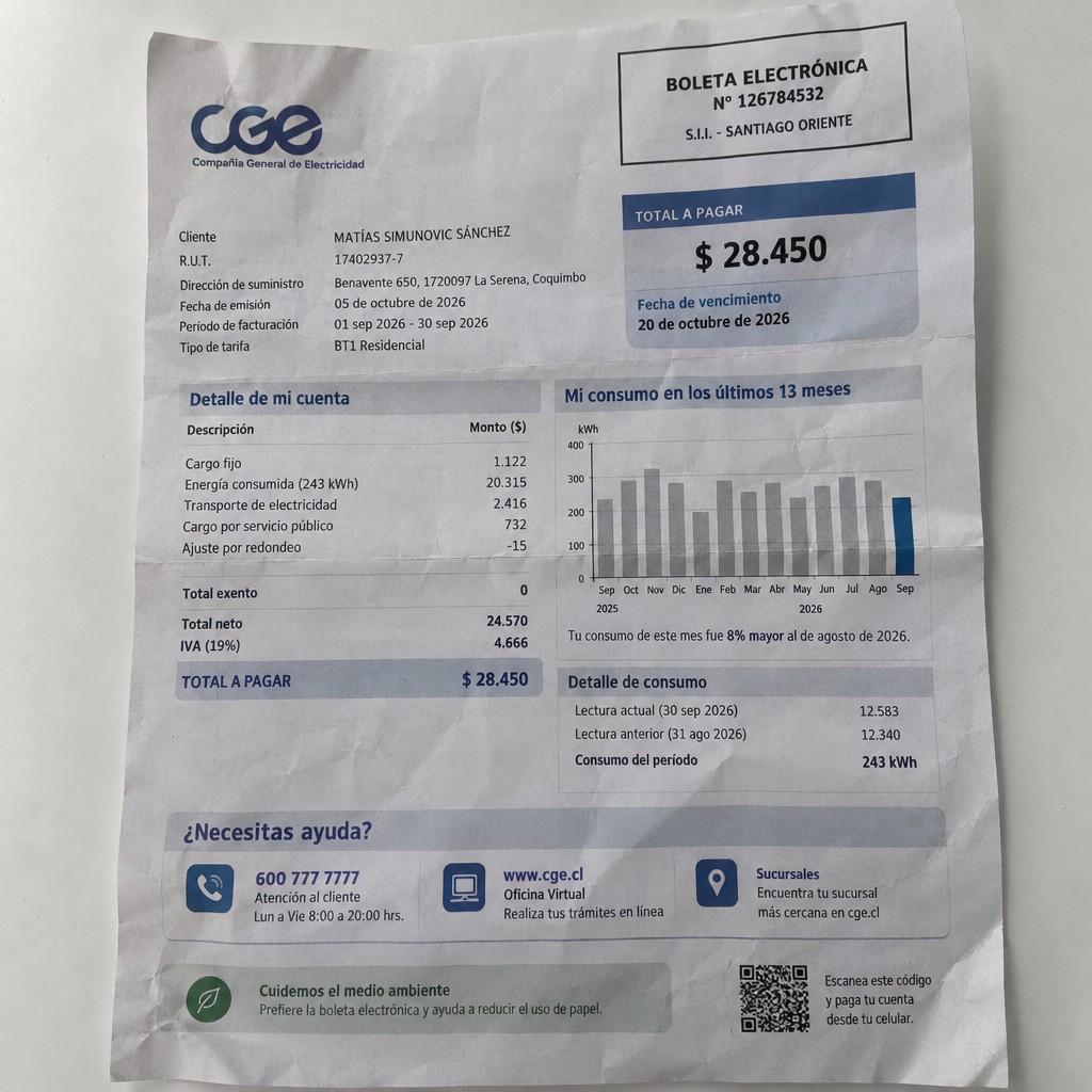 Create a statement, an electricity bill in CHILE. The A4 statement should be realistic, as if it were photographed on a phone. The document should be on a white background. The document must be for the last 3 months of October 2026. The document should contain several transactions and be wrinkled at the edges.
Name MATÍAS SIMUNOVIC SÁNCHEZ
Address Benavente 650, 1720097 La Serena, Coquimbo
R.U.T. 17402937-7
Date of birth 23.10.1989