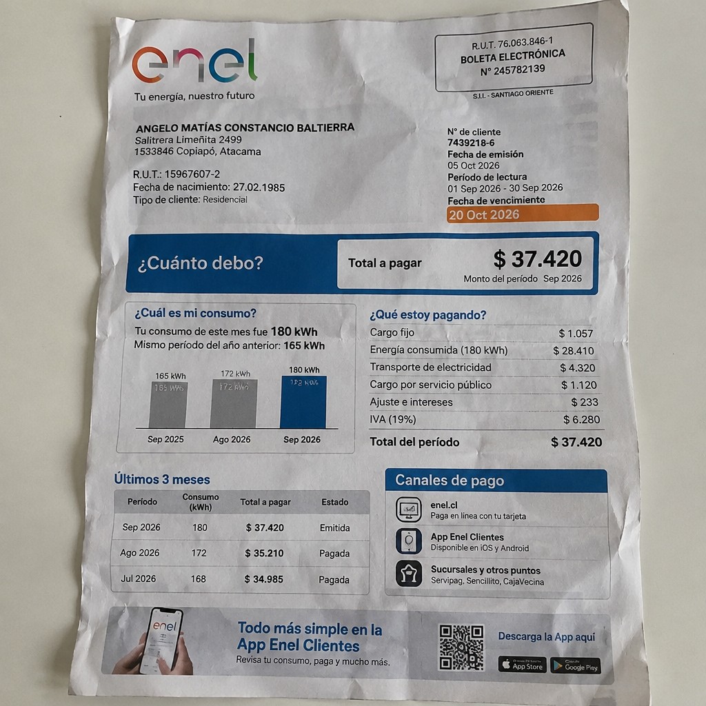 Create a statement, an electricity bill in CHILE. The A4 statement should be realistic, as if it were photographed on a phone. The document should be on a white background. The document must be for the last 3 months of October 2026. The document should contain several transactions and be wrinkled at the edges.
Name ANGELO MATÍAS CONSTANCIO BALTIERRA
Address Salitrera Limeñita 2499, 1533846 Copiapó, Atacama
R.U.T. 15967607-2
Date of birth 27.02.1985