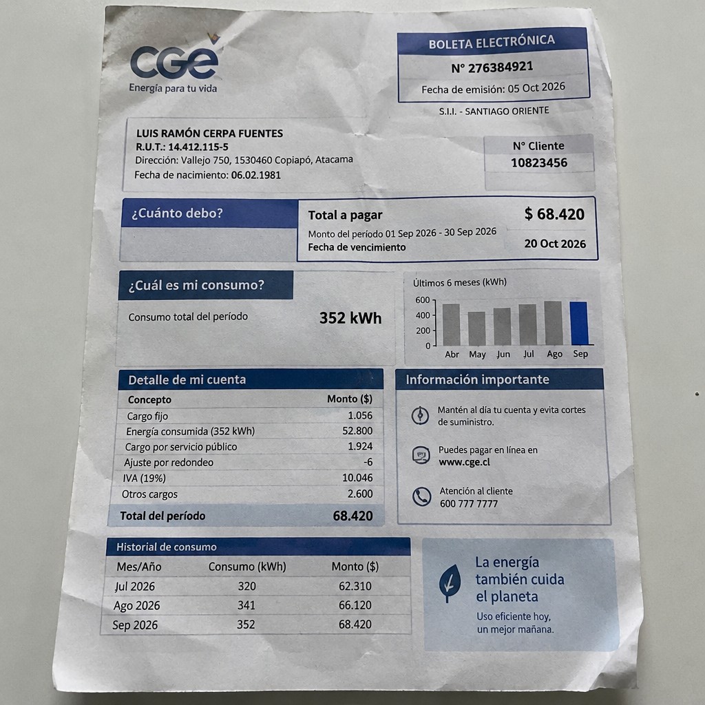 Create a statement, an electricity bill in CHILE. The A4 statement should be realistic, as if it were photographed on a phone. The document should be on a white background. The document must be for the last 3 months of October 2026. The document should contain several transactions and be wrinkled at the edges.
Name LUIS RAMÓN CERPA FUENTES
Address Vallejo 750, 1530460 Copiapó, Atacama
R.U.T. 14412115-5
Date of birth 06.02.1981