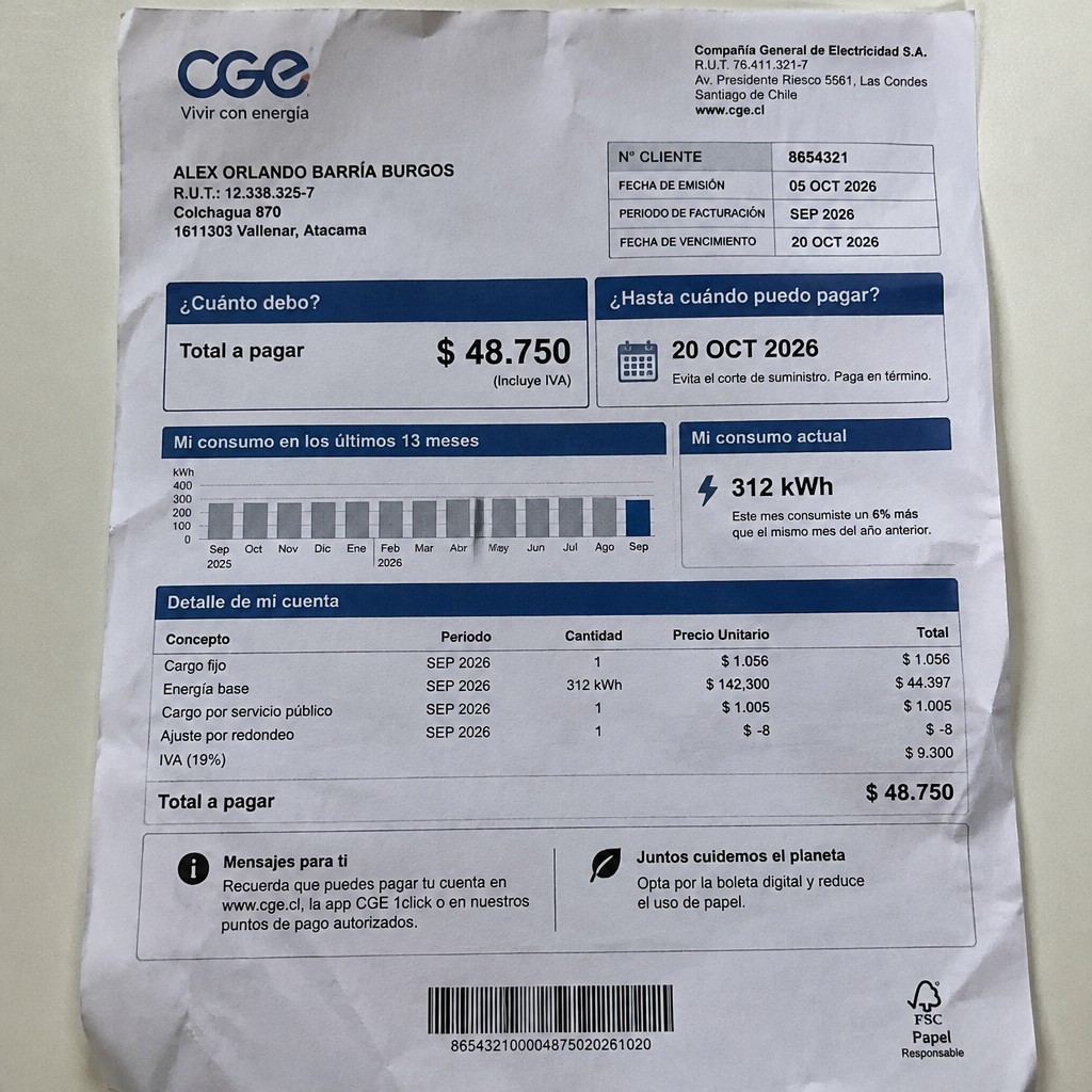 Create a statement, an electricity bill in CHILE. The A4 statement should be realistic, as if it were photographed on a phone. The document should be on a white background. The document must be for the last 3 months of October 2026. The document should contain several transactions and be wrinkled at the edges.
Name ALEX ORLANDO BARRÍA BURGOS
Address Colchagua 870, 1611303 Vallenar, Atacama
R.U.T. 12338325-7
Date of birth 11.03.1973