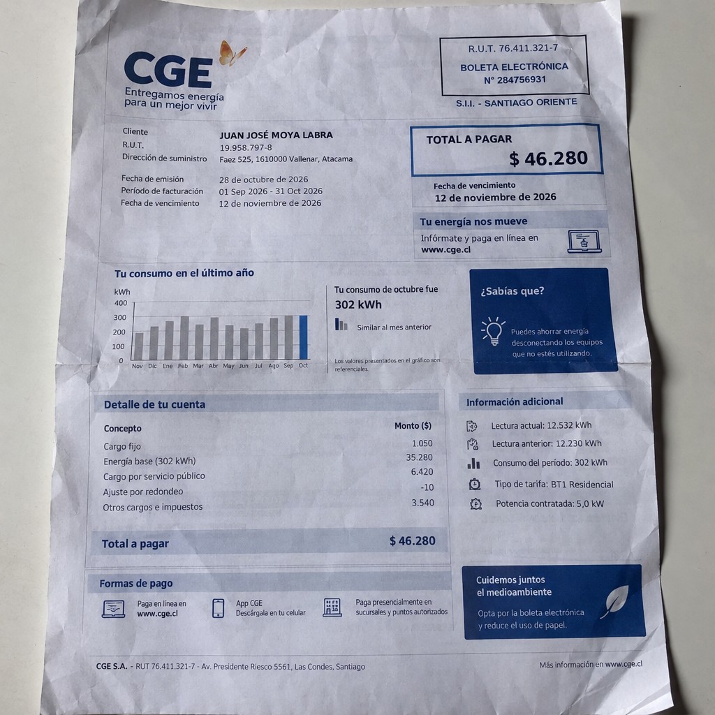 Create a statement, an electricity bill in CHILE. The A4 statement should be realistic, as if it were photographed on a phone. The document should be on a white background. The document must be for the last 3 months of October 2026. The document should contain several transactions and be wrinkled at the edges.
Name JUAN JOSÉ MOYA LABRA
Address Faez 525, 1610000 Vallenar, Atacama
R.U.T. 19958797-8
Date of birth 04.07.1998