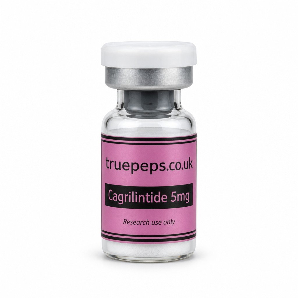 Create a professional studio product photograph of a glass pharmaceutical vial with a white flip-off cap and silver crimp collar, containing white lyophilised powder. Label: pink background with black double-line border, "truepeps.co.uk" wordmark at the top, a black bar containing "Cagrilintide 5mg" in pink text, and "Research use only" in small italic text at the bottom. Center the vial upright, straight-on eye-level angle, full label facing camera and fully legible. Seamless pure white studio background, soft even diffused lighting with no harsh glare, subtle soft realistic shadow beneath the vial, sharp focus throughout, professional e-commerce product photography style, high detail, 4K.